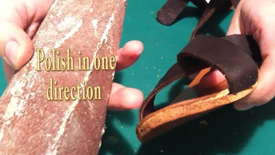 finishing the edge of the sandal's sole in this step of handcrafted sandals making finishing the edge of the sandal's sole in this step of handcrafted sandals making