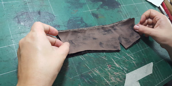 Attaching fabric to shoe leather